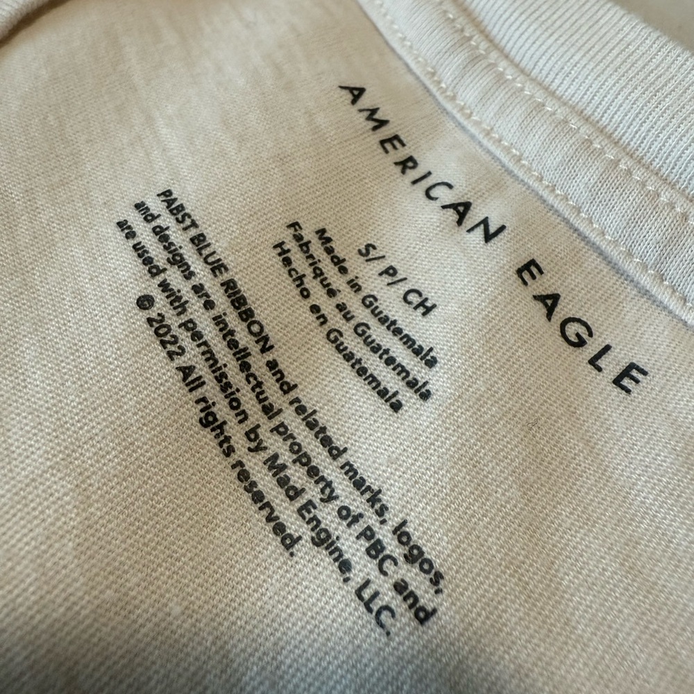 American Eagle By Payless Cream and Red Short Sleeve Tee - Picture 2 of 5